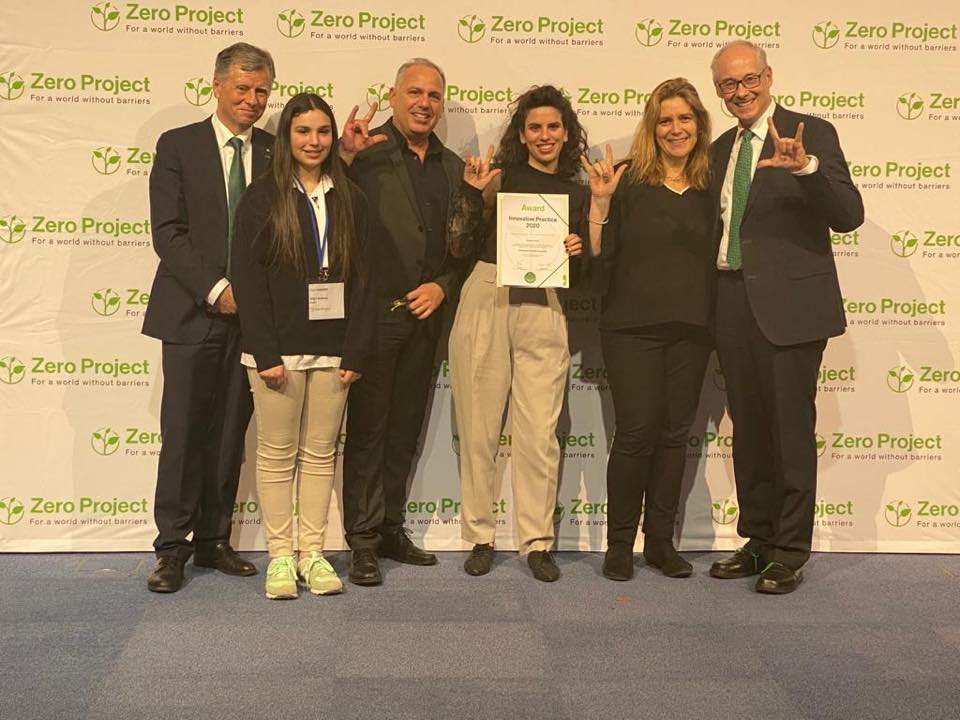 Conference directors and Access Israel's delegation members with the award